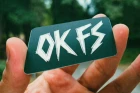 Sticker OK FS KOUINIA DUSTY tenu en main